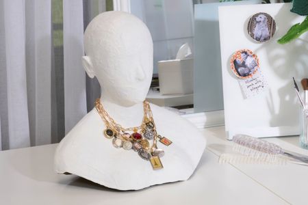 Picture of DIY necklace that uses 21709 Aleene's Jewelry & Metal Glue .7 fl. oz. on a mannequin head 